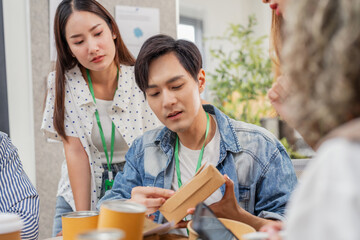 Creative ESG brainstorming session for earth friendly reuse recycle packaging campaign. Team develops viral environmental social impact strategy through sustainable innovation purpose driven marketing