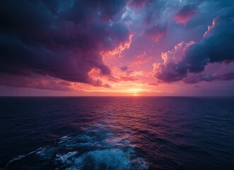 Fototapeta premium Dramatic sunset over a vast ocean