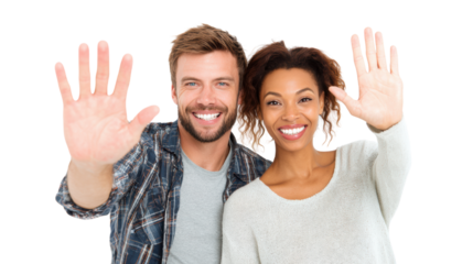 Happy couple smiling and waving hello, isolated on a white background.