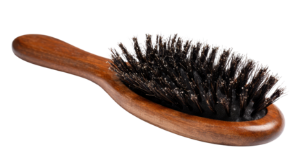 Wooden hairbrush with bristles, isolated on a white background.