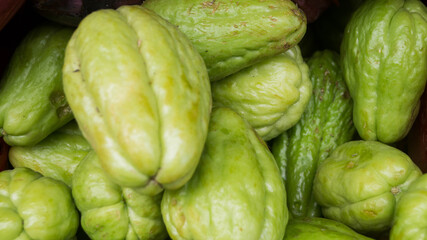 A photograph of Chayote sold in a market. Taken from Las Pinas, NCR, Philippines.