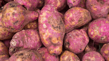 A photograph of sweet potatoes sold in a market. Taken from Las Pinas, NCR, Philippines. 