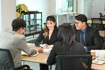 A group of business people partners during a set team meeting in the modern office.High quality