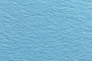 Blank light blue paper texture suitable for various design applications including backgrounds, stationery, or artistic projects