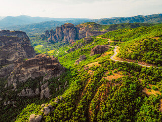 Obraz premium The monastery Meteora, aerial rocky monasteries complex in Greece near Kalabaka city. Holy Monastery of the Great Meteoron and Varlaam