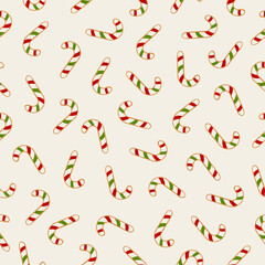 Seamless candy cane pattern in red, white, and green on warm cream, playful Christmas background for wrapping, textiles, and cards.