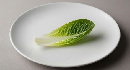 Obraz premium Bitter Herb Leaf on Plain Plate