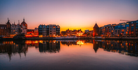 Gdansk with Motlawa river in Poland. Old town colourful house with Stragania Gate © Zedspider
