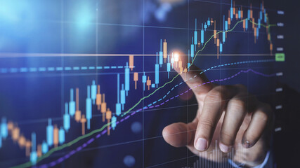 Stock Market Data Analysis – Financial Analyst Pointing at Candlestick Chart for Trading, Investment, and Market Research