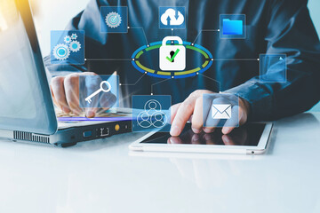 Security data protection and network security system .businessman using laptop computer with an encrypted data security system.