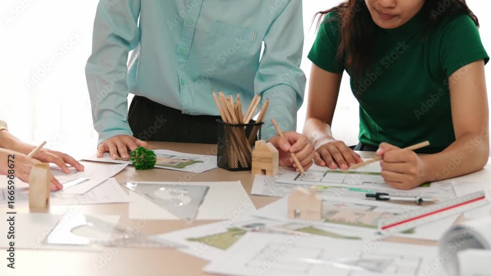 Poster a video of architect use measurement tools and pencil to measure blueprint. architect design house c
