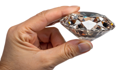 A human hand holds a crystal gem reflecting surface in a concept of care and environmental business