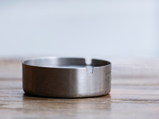 rain-soaked ashtray outdoors