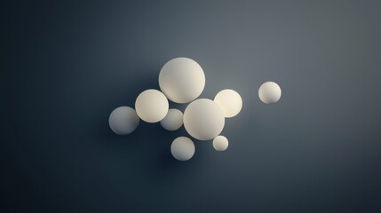 A cluster of white spheres of varying sizes and positions against a dark blue background.