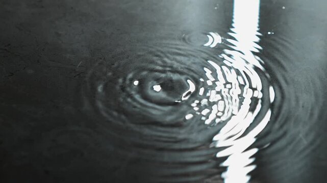 A stream of water pours onto the floor from the roof.
Flooding in the house and technical problems in the water supply system to the house.
Roof leaking and a large puddle on the floor.