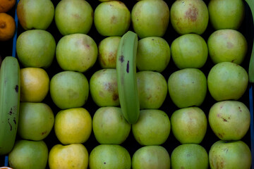 fresh apples on market stall