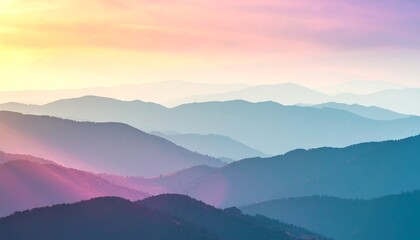 Obraz premium Pastel Mountain Range Silhouette with Gradient Sky and Atmospheric Perspective