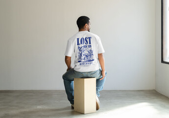 Mockup Of Man Wearing Customized T-Shirt On Plinth