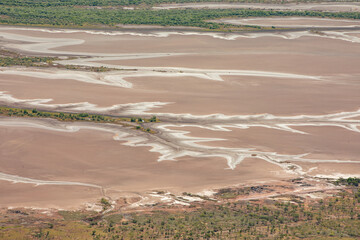 Oblique aerial view of mangroves, the tidal mud flats and marshes near Wyndham in Cambridge Gulf in the Kimberley region of Western Australia.