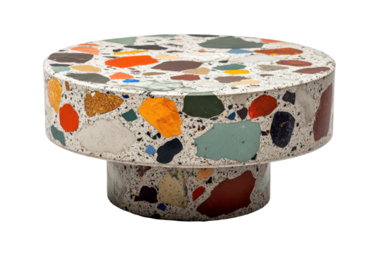 Colorful terrazzo round ottoman isolated on transparent background. Large round terrazzo pedestal featuring multicolored chips offering a vibrant and artistic design isolated on white background.