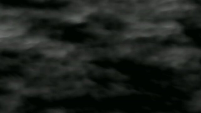 Dark and moody image of a dark gray and black cloudy sky, suitable for backgrounds, graphic design, or ominous concepts.