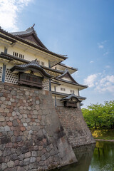 Kanazawa Castle and Moat in Japan on Summer Day