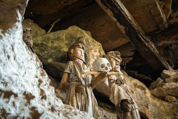Tau Tau statues in a cave, Toraja, Sulawesi, Indonesia