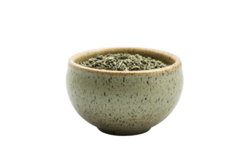 Ceramic bowl filled with dried herbs isolated on transparent background. Green tea in a ceramic cup isolated on white background.