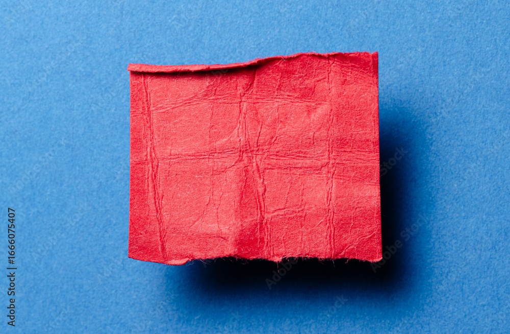 Aufkleber one single red torn ripped wrinkled crumpled blank paper note with drop shadow, folded edge and copy