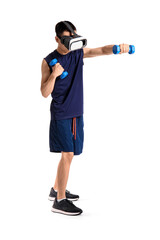 Sporty young Asian man in VR glasses exercising with dumbbells on white background