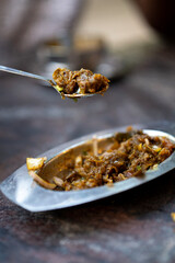 Closeup Mushroom Manchurian with spoon 