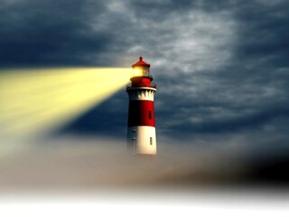 Lighthouse gives hope vision and guidance through beam of light into darkness and thick stormy cloudy night sky. 