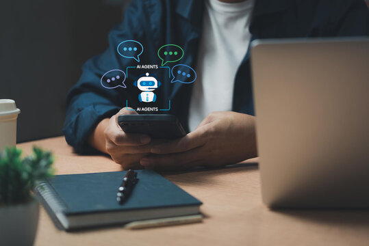 AI agent chat service and customer support. Artificial intelligence helping and assisting customer. Person using laptop computer to ask questions to AI at desk.