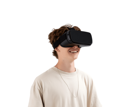 Young man smiling while wearing a virtual reality headset