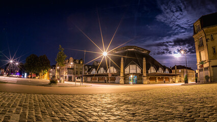 The halls of the covered market in Soissons - Night view