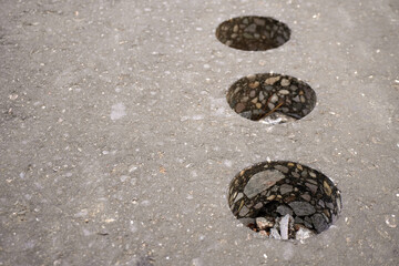 Core drilling showing cross section of asphalt road surface