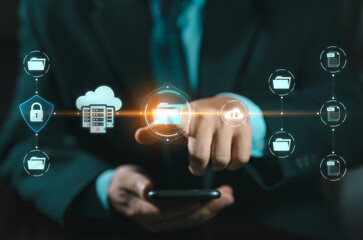 DMS Document Management System concept. Data storage. Businessman using a tablet and touching folder icon to search on databases with virtual screen. documents digital for corporate businesses.