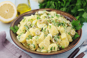 A bowl with Greek potato salads	