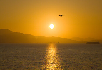 Sardegna, Italy - The worderful south coast of Sardinia region, in the area of Sulcis, province of Cagliari. Here in particular the port of Cagliari at sunset