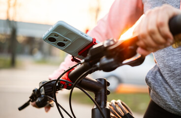 Female Hands On A Bicycle Handlebar