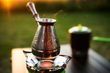 Cezve Heating Water On A Portable Gas Stove