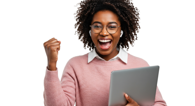 Young african american woman cheering triumphantly, pink sweater, glasses, earbuds, laptop. White studio background, concept of professional triumph and achievement.