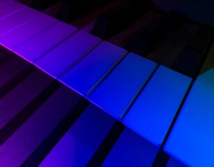 Close-up view of illuminated piano keys, showcasing vibrant hues of blue and purple.