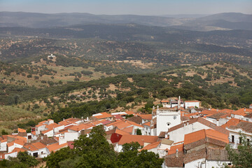 Fototapeta premium Whitewashed houses and green valley. Valle Matamoros, Badajoz. Extremadura, Spain