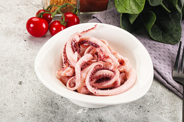 Marinated squid tentacles in the bowl