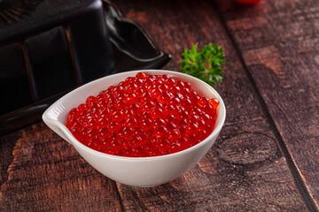 Salmon red caviar in the bowl