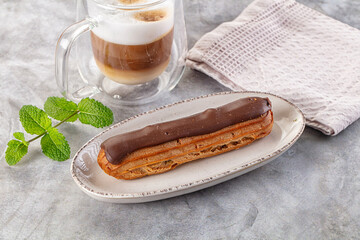 Gourmet chocolate eclair with icing