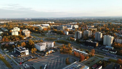 Fototapeta premium Modern high-rises and parking lots at sunset