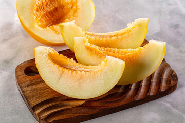 Ripe sweet juicy melon with slices