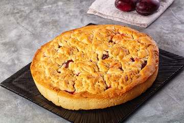 Sweet homemade pie with plums